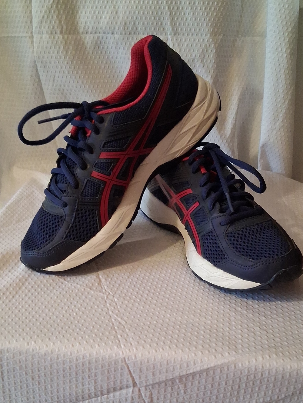 Women's Size 6 Asics Navy Running Shoes with Red Accents